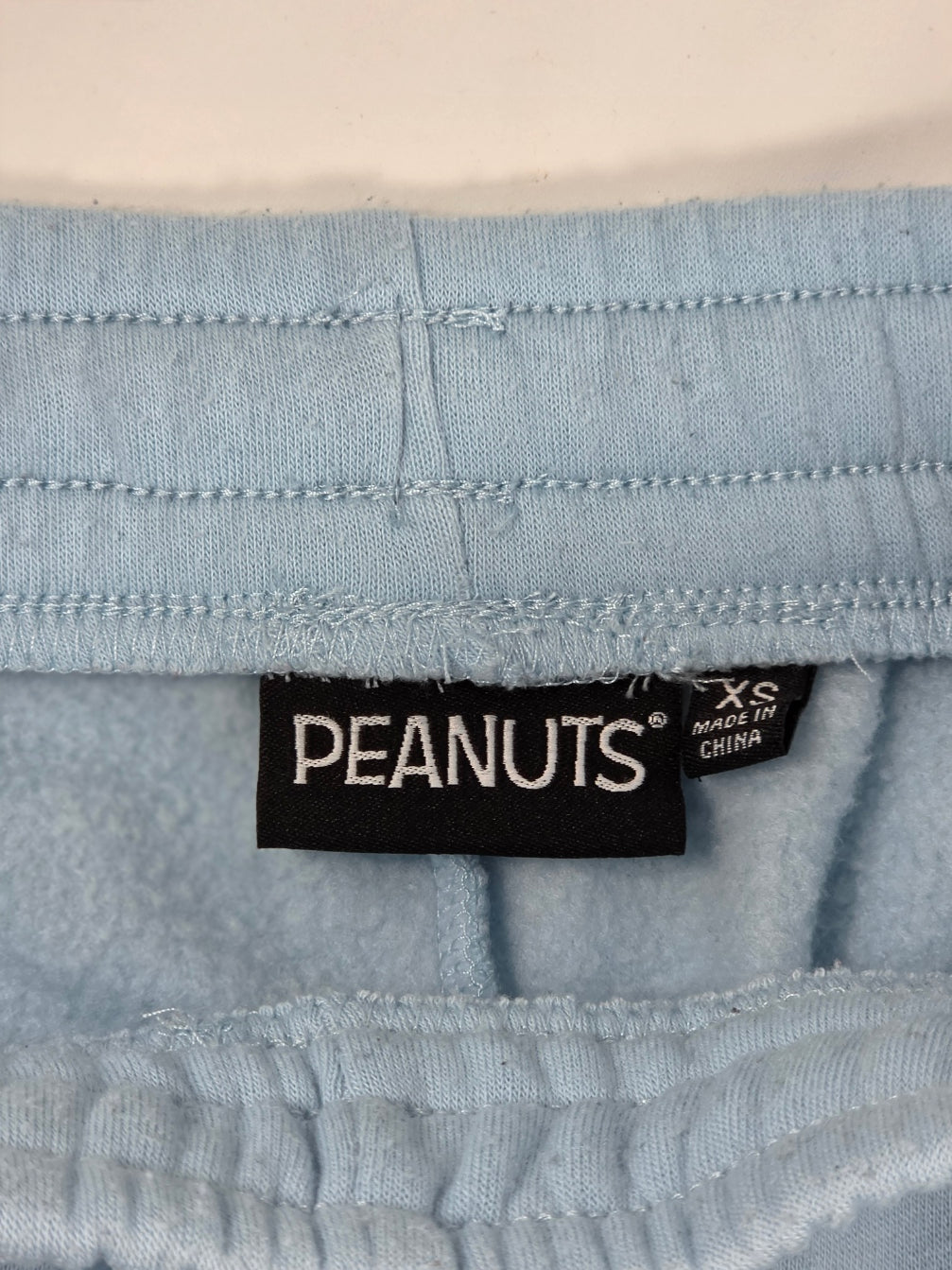 Peanuts Snoopy Joe Cool Graphic Jogger Sweatpants Light Blue XS
